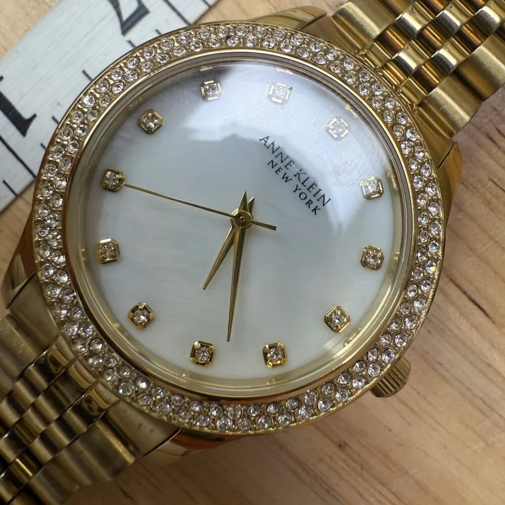 Anne Klein New York Womens Gold-Tone Watch With Crystal Accents & Mother-Of-Pear